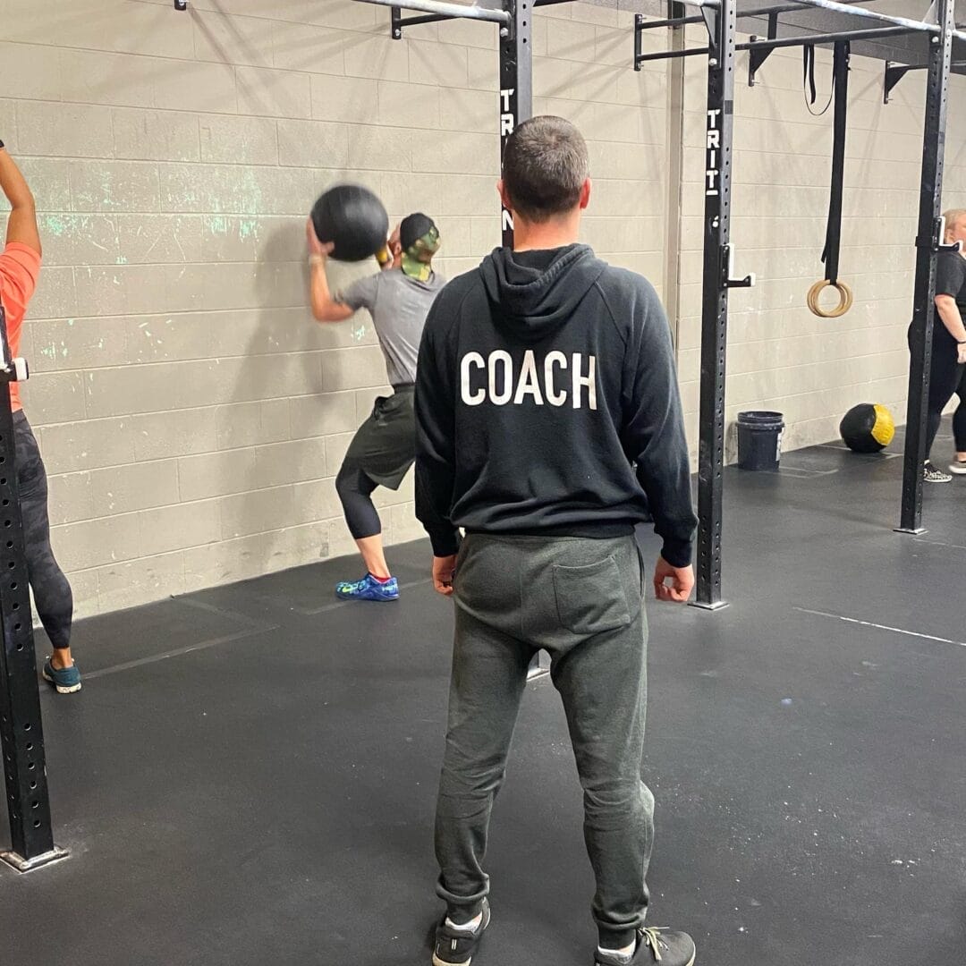 Coach Observing Training Session from Behind