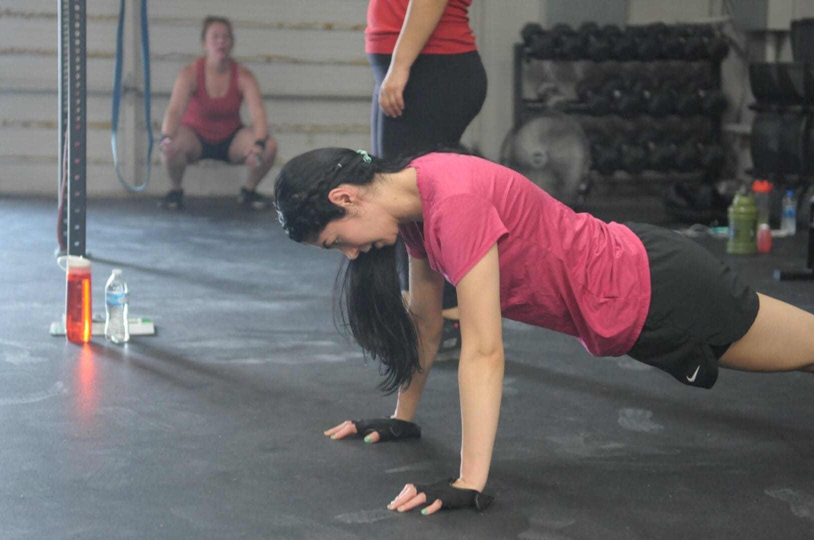 Women Doing Push-Ups at Smyrna Strength and Fitness