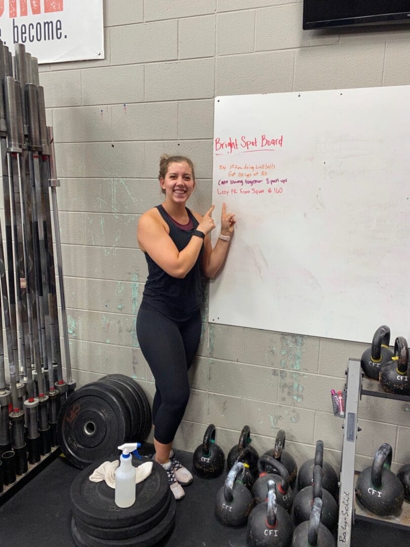 Coach showing white board