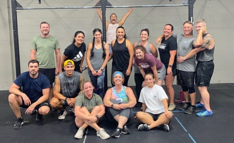 Group of people exercising together during a guided workout session